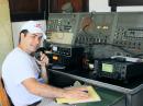 ARRL Member Jason Phillips, KD9HFW, from Kenosha, Wisconsin, operating from Special Event Station W9ZL, organized by the Fox Cities Amateur Radio Club of Appleton, during EAA AirVenture. The station is set up in the historic (and relocated) Mauston Aeronautical Beacon building, which helped pilots stay on course with night navigation between Chicago and the Twin Cities from the 1920s to the 1980s. [Bob Inderbitzen, NQ1R, photo]